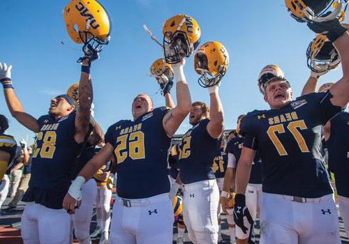 At the end of the day, there was a lot to celebrate, including the Bears’ 56-27 win over UC Davis. The team racked up a Division I program record score, with eight touchdowns. Shown here are sophomores Zach Wilkinson (77) and Austin Bown (52), redshirt freshman Cody Wilson (65) and senior Sean Leslie (83).