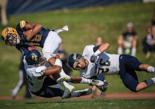 Alex Wesley, a wide receiver from Murphy, Texas, carries the ball for the Bears. Redshirted as a freshman, Wesley is also a track and field standout for UNC who qualified
for the NCAA West Regionals in the 400-meter dash last year.