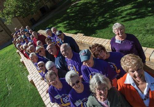 The Class of 1965 gathers on Hi Bridge in celebration of their 50th Reunion during Homecoming Weekend.